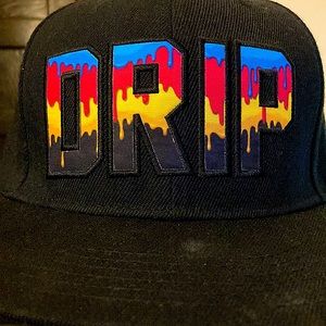 I’m selling a black and rainbow drip hat for kids 9-12 boys or girls